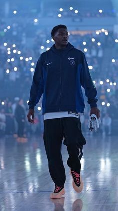 NBA basketball wallpaper background of Minnesota Timberwolves star Anthony Edwards at the pre-game ceremony with lights in the crowd behind him American Basketball Aesthetic, Ant Edwards Wallpaper, Anthony Edwards Wallpapers 4k, Minnesota Timberwolves Wallpaper, Anthony Edwards Aesthetic, Anthony Edwards Wallpaper, Timberwolves Wallpaper, Basketball Background Aesthetic, Nba Aesthetic