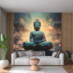 a buddha statue sitting on top of a white couch in a living room next to a painting