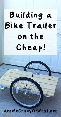 a bike trailer on wheels with the words building a bike trailer on the cheap