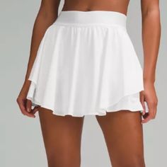 Court Rival High Rise Skirt Long Size: 12 (X-Large) Condition: New With Tags Color: White White Sports Skirt For Summer, White Sport Skirt For Summer, White Sports Swim Skirt, White Skirted Swim Skirt For Sports, White Flowy Tiered Tennis Skirt, White Sporty Skort For The Beach, White Sporty Skort For Beach, Sporty White Skort For Beach, White Swim Skirt For Sports