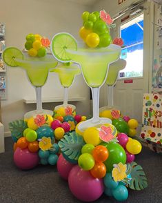 there are many balloons in the shape of cocktails