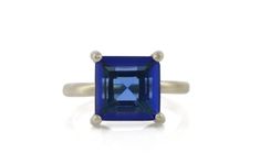 925 Sterling Silver Ring - Terrific Blue Sapphire Ring - Cutest Ring -  Size- 10x10 MM - Square Rings - September Birthstone Ring - For Her This Sterling Silver Gemstone Ring is perfect as a gift item, for you and especially your loved ones. We Also Accept Wholesale Or Orders And All Kinds Jewelry & Gemstones Re Available In Small And Bulk Quantity. For Any Query Please Contact Us. * All our jewelry is Micron Plated which is higher quality as compared to Standard Plating * Please note that there will be slight variations in stone texture and color shades in the actual product that you receive. Stone quality or grade will be same. Product Info  Gemstone -- Blue Sapphire Size -- 10x10 MM. Metal -- 925 Sterling Silver Style -- Minimalist Manufacturer In -- India  Stone Color - Blue  Band Colo Blue Sapphire Ring With Square Cut, Modern Blue Sapphire Ring With Bezel Setting, Classic Blue Square Cut Rings, Blue Topaz Ring With Square Cut, Modern Blue Birthstone Ring For Gift, Blue Square-cut Gemstone Rings, Blue Topaz Ring With Square Cut Gemstone, Square Cut Blue Gemstone Ring, Modern Blue Solitaire Jewelry