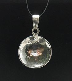 STERLING SILVER PENDANT. ,APPROXIMATE WEIGHT 2.6 GRAMS,, DIAMETER 1.9CM . All our jewels are made from solid sterling silver 925/1000 and are carefully crafted by hand in our family workshop.We dispatch your orders in 5 working days, worldwide and the postage is $5. We ship registered priority mail. Please allow 5-7 working days for delivery in Europe and 10-15 working days outside Europe.For any questions – please do not hesitate to contact me! Nickel Free Silver Round Pendant Jewelry, Nickel-free Silver Round Pendant Jewelry, Silver Nickel Free Round Pendant Jewelry, Silver Jewelry With Large Round Disc Pendant, Sterling Silver Coin Pendant Jewelry, Hammered Sterling Silver Round Pendant, Hammered Sterling Silver Round Pendant Jewelry, Silver Hammered Pendant Jewelry, Sterling Silver Shiny Jewelry