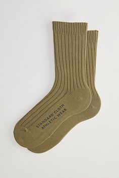 Simple knit trouser socks by Standard Cloth with a ribbed ankle cuff. Urban Outfitters exclusive. Features Standard Cloth classic trouser crew sock Ribbed knit socks Crew length UO exclusive Content + Care Includes 1 pair 85% Cotton, 13% polyester, 2% spandex Machine wash Imported Size Crew sock height Fits US Men's shoe size 7-12 | Standard Cloth Classic Trouser Crew Sock in Olive, Men's at Urban Outfitters Casual Fitted Socks With Ribbed Cuffs, Classic Cotton Socks For Winter, Winter Cotton Socks With Ribbed Cuffs, Wool Socks Men, Classic Mid-calf Cotton Socks, Mens Socks Target, Cotton Socks Brown, Ribbed Cotton Mid-calf Socks, Outdoor Socks