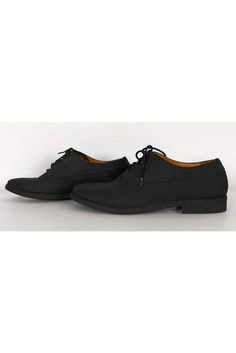 The classic oxford style shoe is reinvented with this pair from Maison Martin Margiela. Their textured design adds a one-of-a-kind flair. Perfect for casual wear, these shoes are a must-have. Size 6.5 - EU 36.5 Textured upper Leather lining Man made sole Made in Italy Rounded toe Lace up front Light wear on sole Heel height 1" Oxford Shoes Style, Oxford Style, Textured Design, Martin Margiela, Black Textures, Casual Wear, Heel Height, Oxford, Lace Up