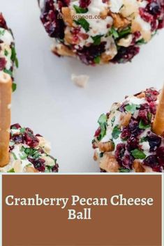 cranberry pecan cheese ball on a plate with text overlay that reads, cranberry pecan cheese ball