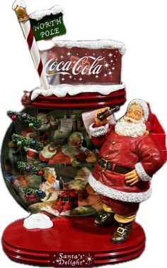 a santa clause figurine holding a bottle of coca - cola