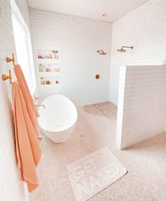 a bath room with a toilet and a bath tub