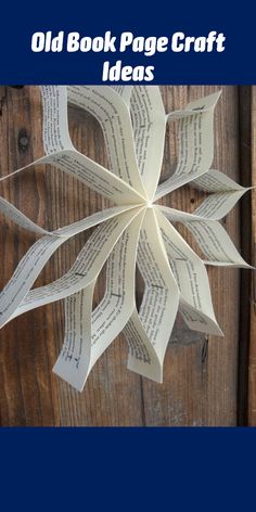 an origami snowflake made out of old book pages with the words old book page craft ideas