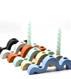 an assortment of different colored toothbrush holders