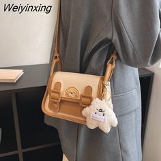 Shipping: Worldwide Express Shipping AvailableDelivery time: 🚚7-15Days Fast ShippingReturns: Fast refund,💯100% Money Back Guarantee.Brand Name: NoEnName_NullHandbags Type: Messenger BagsMain Material: PULining Material: nylonShape: Casual TotePlace Of Origin: ZHE JIANG ProvincePlace Of Origin: ZHE JIANG ProvinceOrigin: Mainland ChinaCN: ZhejiangHardness: HARDPattern Type: SolidExterior: NONEOccasion: VersatileClosure Type: zipperGender: WOMENStyle: FashionNumber of Handles/Straps: twotexture: Kawaii Beige Bags For Students, Kawaii Beige Bag For Students, Cute Beige Bags For Students, Cute Beige Shoulder Bag For School, Cute Beige School Shoulder Bag, Trendy Cream Satchel For School, Cute Brown Bag For Students, Cute Brown Bags For Students, Cute Beige Shoulder Bag Satchel