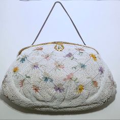 Vintage Handbag. Fully Beaded. Intricate Detailing On Metal Closure. Beaded Closure. Embroidered Flowers In Between White Beads. Chain Handle. Vintage White Bag With Pearl Handle, Vintage White Bags With Pearl Handle, Daily Use White Beaded Bags, White Beaded Bag For Everyday Use, Vintage White Embroidered Bags, White Beaded Handheld Evening Bag, Vintage White Handmade Shoulder Bag, Vintage Handmade White Shoulder Bag, Vintage White Handheld Shoulder Bag