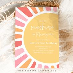 an orange and pink birthday card with the words sunshine in it on top of a white blanket