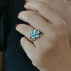 Aqua Flower Pear Color Ring*14K Trendy Gold Ring For girl*For Women*For Mother Flower Ring New Year Jewelry # Features * Gram:3.35 gr(approximate weight) * Size: 15 mm * Production Method:CASTİNG +Hand Made Polish  *Gemstones:Cubic Zircon  *Shape:Pear,Round * 14 K (0,585) in gold *Special Gift Box  *Like all precious jewels,it comes in its own gift box. *Can include a little gift note  *The Gold Body Of The Ring İs Polished By Hand. *Available in White gold or Rose Gold choosing Enter the Name Y Fine Jewelry Flower Cluster Ring With Gemstone, Gemstone Flower Ring For Anniversary, Flower Shaped Gemstone Ring For Anniversary, Flower Shaped Diamond Ring Gift, Fine Jewelry Flower-shaped Birthstone Promise Ring, Flower Shaped Cluster Ring Gemstone For Promise, Fine Jewelry Flower Promise Ring, Flower Shaped Birthstone Ring For Anniversary, Fine Jewelry Flower Cluster Ring Gift