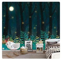 a bedroom with a forest wallpaper and stars in the sky