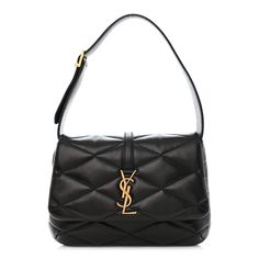 This is an authentic SAINT LAURENT Lambskin Quilted Le 57 Diamond Shoulder Bag in Black. This elegant shoulder bag is crafted of quilted lambskin leather in black. The bag features aged gold hardware, diamond quilting, an adjustable leather shoulder strap, and a YSL emblem on the front flap. The flap opens to a black suede interior with a flat pocket. Shoulder Bag Black, Lambskin Leather, Black Suede, Gold Hardware, Saint Laurent, Quilting, Shoulder Strap, Shoulder Bag, Leather