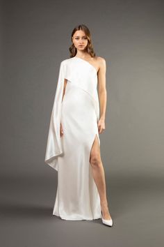 Asymmetrical gown with cape - ivory (preorder) Asymmetrical Gown, Wedding Dress Topper, Gown With Cape, Dress Topper, Bridal Wardrobe, High Neck Wedding Dress, Neck Wedding Dress, Maid Of Honour Dresses, Halter Gown