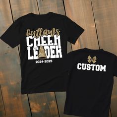 Custom Glitter Cheerleader Shirt *This custom shirt is handmade with professional vinyl. *Our shirts are unisex and are true to size! *In the photo's you will be able to see the custom options in regards to color that you may choose from. *We use 100% cotton shirts. The glitter material does not wash off and will last through multiple washes.  *If your shirt color is out of stock we will contact you as soon as possible to see if you would like to change shirt colors. By purchasing from us you agree to the following statements: *Due to the custom nature of this item we do not accept exchanges or refunds. *We are also not responsible for lost packages. Please contact your local post office for lost package information. School Spirit Glitter Print Short Sleeve Top, Customizable Short Sleeve Tops For Cheerleading, School Spirit Short Sleeve Top With Glitter Print, Black Glitter Print T-shirt For Cheerleading, Black Glitter T-shirt With Short Sleeves, Short Sleeve Tops With Glitter Print For School Spirit, Black Glitter Short Sleeve T-shirt, Team Spirit T-shirt With Glitter Print For Cheerleading, School Spirit Glitter Print Crew Neck T-shirt