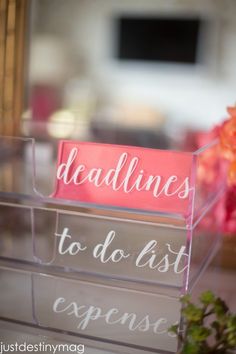 two clear acrylic signs that say deadlines to do list