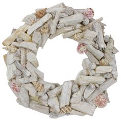 Bring this fun nautical theme wreath to your home decor to transport you to your own little piece of paradise. Hang on any wall or door in your home or office to accent your already existing decor. Product Features: Driftwood and seashell summer time wreath Flat back allows the wreath to lay nicely against any flat surface whether it is on a table as a centerpiece or hanging on the wall Designed to be used with a wreath hanger - not included Recommended for indoor use only - if using outdoors place under a covered area Dimensions: 3" high x 12" diameter (measured from outermost tip to outermost tip) Material(s): wood/seashells/foam Northlight 3-in White Indoor Hanging Wreath Artificial Wreath | 31516487 Fall Floral Decor, Floral Door Wreaths, Seashell Wreath, Farmhouse Holiday, Wreath Hanger, Artificial Wreath, Hanging Wreath, Seashell Crafts, Mantel Decorations