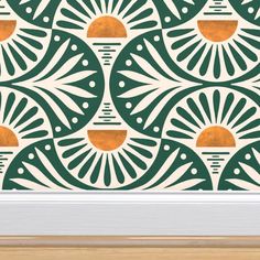 a green and white wallpaper with an abstract design in the center is framed by a wooden frame