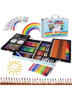 an assortment of colored pencils and markers in a metal case next to a drawing kit