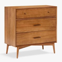 Bring classic mid-century design to your big kid's room with this stylish dresser. Inspired by iconic '50s and '60s silhouettes, it features gently tapered legs and a modern profile that looks sleek in any space. Three spacious drawers provide generous storage for all their essentials. Designed in collaboration with west elm. HOW IT IS CONSTRUCTED Acorn-finished dresser is expertly crafted from solid eucalyptus wood, engineered wood, beech wood, acacia veneers and MDF. White-finished dresser is Moody Nursery, Mid Century Nursery, Serene Bathroom, Minimalist Closet, Changing Table Pad, Mid Century Dresser, Big Kids Room, 3 Drawer Dresser, Kids Dressers