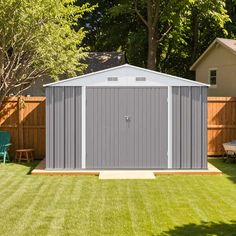 a small shed in the middle of a yard