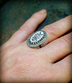 Hand-stamped with a Lunar story, honoring the mystery and power in a favorite Celestial body, the Moon, our Celestial Totem Ring features the powerful symbol of the Crescent, the form that begins the moon's waxing is identical to that shape which completes the moon's waning. A symbol reminding us there is an end to every beginning and equally the promise of renewal, whenever there is an ending. A weighty Sterling Ring, the medallion is with an approximately 3mm wide half round band, crafted in s Crescent Moon Symbol, Moon Symbols, Sterling Ring, Hand Stamped, Crescent, Class Ring, Turquoise Ring, The Moon, Moon