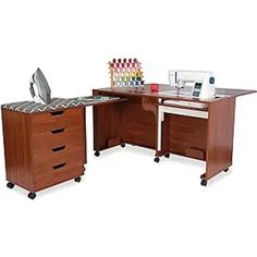 an office desk with two drawers and a sewing machine