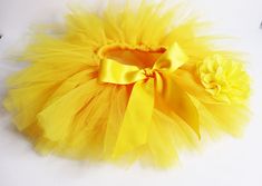 This yellow tutu skirt is a must have for your baby girl! It comes with a matching yellow headband. Also available in purple and turquoise.  Buy two skirts and save. Multilayered soft tulle made out of Nylon/Cotton blend with an elastic waistband. Tutu skirt is gentle on the skin made with soft tulle decorated with a ribbon bow. Suitable for 3 to 12 months old. Perfect for a photo shoot, special occasions or looking fancy on any given day! Tutu Skirt Dimensions: Waist 16-19" ( 42-50cm) and Lengt Yellow Tutu Skirt, Baby Tutu Skirt, Infant Tutu, Yellow Tutu, Yellow Headband, Yellow Baby, Baby Tutu, Soft Tulle, Baby Yellow