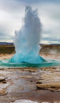 a geyser spewing out water into the air