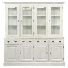 a white china cabinet with glass doors and drawers on the front, against a white background