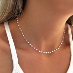 Our choker is adjustable with white pearls set. It is perfect to wear on a daily basis or on special occasions. It is a minimalist style, it is a very simple but at the same time elegant necklace. It combines with everything! A good gift idea. - MATERIAL: * Silver * 18 kt gold plating - CHAIN LENGTH: * 40 cm extendable to 5cm - PEARL DIAMETER: *4mm YOU CAN ALSO ASK FOR CUSTOM NECKLACE SIZE (Write us by message) All our jewelry is handmade with love, designed and created by us. We are lovers of jewelry and fashion, that is why we put so much passion into our work. MAD JEWELRY Simple Silver Jewelry, Stacked Necklaces, Silver Pearl Necklace, Heart Choker, Minimalist Gifts, Fresh Water Pearls, For Her Gifts, Gold Heart Necklace, Fresh Water Pearl