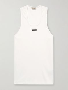 Fear of God's tank top is appliquéd with the label's signature logo patch on the chest. Cut from ribbed stretch-cotton, it has a relaxed shape emphasised by wide armholes and an elongated hem.. Plain Tshirt, Cotton Tank Top, Suede Jacket, Formal Shirts, Signature Logo, Stretch Cotton, Down Jacket, Patch Logo, Wardrobe Essentials