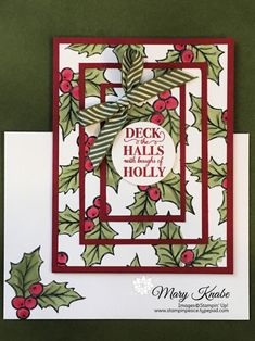 a christmas card with holly leaves on it and the words deck the hall's holiday holly