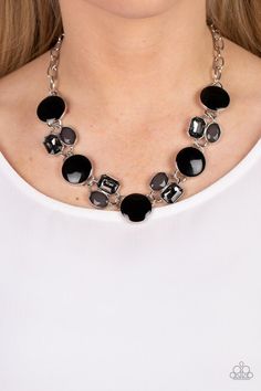 Sparkling smoky gems combine with black beads and alternate across the collar with oversized discs painted in black enamel. The whimsically modern collection connects to a silver chain resulting in a charismatic display below the collar. Features an adjustable clasp closure.

 Sold as one individual necklace. Includes one pair of matching earrings. Bracelet Display, Earring Display, White Rhinestone, Black Necklace, Black Earrings, Paparazzi Jewelry, Stunning Earrings, Short Necklace, Matching Bracelets