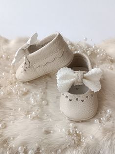 Introducing our Premium Genuine Leather Baby Shoes! 👶 Elevate your little one's style with these adorable and practical baby shoes. Crafted with love and precision, these tiny shoes are designed to keep your baby's feet cozy and stylish as they take their first steps. 🌟 Key Features: Premium Genuine Leather: Ensure your baby's comfort and long-lasting durability with our high-quality, soft, and genuine leather. Adorable Design: Stylish and practical, these shoes add a touch of charm to every s Cute Booties For Baptism, Cute Round Toe Booties For Baptism, First Birthday Closed Toe Non-slip Booties, Baptism Booties With Soft Sole And Round Toe, Spring Gift Booties With Soft Sole, Gift Rubber Sole Round Toe Booties, Gift Booties With Rubber Sole And Round Toe, White Non-slip Booties With Round Toe, Cute Cream Non-slip Booties