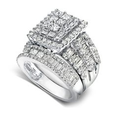 a white gold ring set with two rows of baguettes and diamonds on each band