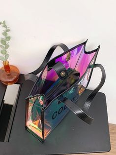 Bag For Love - Clear Holographic Shoulder Tote Bag - Women Tote Bags Product Description Color Multicolor Quantity 1 piece Type Shoulder Tote Bag Material PVC Composition 100% Polyvinyl Chloride Size Chart INCH CM Size Bag Width Bag Height Bag Length one-size 1.6/3.5 7.9/11 7.9/13 Size Bag Width Bag Height Bag Length one-size 4/9 20/28 20/33 Similar Products h2 { text-align: center; } .red-box { width: 100%; display: flex; flex-direction: row; flex-wrap: wrap; justify-content: center; } .red-box Black Rectangular Shoulder Bag With Letter Print, Rectangular Black Shoulder Bag With Letter Print, Square Shoulder Bag With Letter Print For Shopping, Trendy Square Bag With Letter Print, Black Rectangular Bag With Letter Print, Rectangular Shoulder Bag With Letter Print For Shopping, Rectangular Letter Print Shoulder Bag For Shopping, Rectangular Letter Print Bags For Shopping, Multicolor Rectangular Shoulder Bag With Letter Print