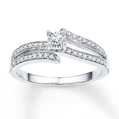 a white gold ring with diamonds on it