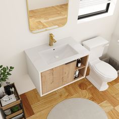 a bathroom with a toilet, sink and mirror in it's centerpieces