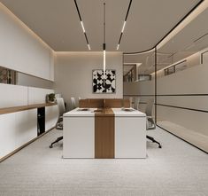 an office with white and brown furniture and carpeted flooring on the walls is lit by recess lighting