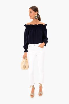 A little bit of shoulder adds a flirty touch, making the Marguerite the perfect date night look. Featuring a standing ruffle neckline and smocked cuffs, this is everything we look for in a going out top; bold, unique and slightly sassy. Pair with white denim and espadrilles for a truly chic outfit.

Off-the-shoulder
Elastic cuff and shoulder
Ruffle detailing
100% polyester
Care: Machine wash cold The Perfect Date, Perfect Date Night, Night Tops, Perfect Date, Chic Outfit, Night Looks, White Denim, Perfect Shirt, Off Shoulder Blouse