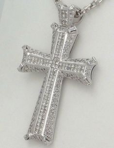 14k White Gold (not plated or filled) 8.00ct Diamond Cross Pendant! VERY NICE PENDANT! So much nicer in person! Diamonds in this pendant are very brilliant and sparkly. Actual item shown! This pendant is newly polished, nice & shiny and in excellent condition. Comes in a free pendant box. Chain not Included Diamonds: 10 Baguette Natural Diamonds, 102 Square Natural Diamonds, & 182 Round Natural Diamonds Carats: 8.00ct est. Color: H - I Clarity: SI1 - SI2 - SI3 Weighs: 41 grams Pendant Me Luxury Silver Jewelry With Baguette Diamonds, Mens Silver Jewelry, Diamond Cross Pendants, Diamond Cross, Cross Jewelry, Gift Accessories, Box Chain, Cross Pendant, Natural Diamonds