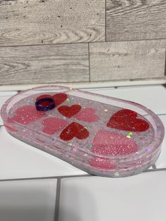 a plastic tray with hearts on it