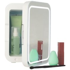 Keep cosmetics or beverages at the perfect temperature with the Mini Skincare Fridge by Home-Complete. This small fridge is big on versatility, warming or cooling its contents to maintain a temperature of 35.6°F (2°C) - 149°F (65°C) so you can enjoy a chilled sheet mask along with a cold can of your favorite beverage in the summer, or have a spa-like experience at home with gently warmed face towels and body creams. This portable fridge can also be used in your vehicle thanks to the included car Mini Fridge Skincare, Skincare Mini Fridge, Mini Skincare Fridge, Wood Makeup Organizer, Skin Care Fridge, Mini Skincare, Small Fridge, Skincare Fridge, Retro Refrigerator