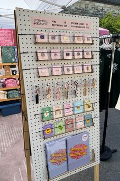 a store display with lots of cards and magnets on it's side wall