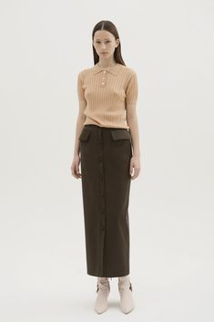 [Description]Tropical wool high waist midi pencil skirt. Pockets and buttons in front. 86% WOOL, 10% PA, 4% LYC / 100% PES Made in GeorgiaValeria is 175cm and she is wearing the small size.[Taxes, Customs and Duties] The prices... Midi Pencil Skirt, Knit Polo, Midi Skirt Pencil, Button Detail, Moda Operandi, Fashion Collection, Rib Knit, Button Downs, High Waisted Skirt