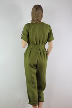 "Write the selected color in the message Linen jumpsuit with belt and 2 pockets in olivecolor, perfect for casual wear and suitable for any occasion in any season Details: - 100% natural linen produced in Europe ; - medium weight (180 gram per square meter); - color: olive, can be any from our colors catalog (color samples at the photo); Made to order, approximately a few days, If you have any questions please message me and I will be glad to answer. Size guide : Size XS Bust: fits bust around 3 Short Sleeve Khaki Jumpsuits And Rompers With Pockets, Khaki Short Sleeve Jumpsuits And Rompers With Pockets, Khaki Short Sleeve Jumpsuit With Pockets, Green Short Sleeve Jumpsuit With Pockets, Casual Olive Jumpsuits And Rompers For Spring, Casual Linen Belted Jumpsuits And Rompers, Green Belted Jumpsuits And Rompers For Summer, Summer Green Belted Jumpsuits And Rompers, Green Tie Waist Jumpsuit For Work